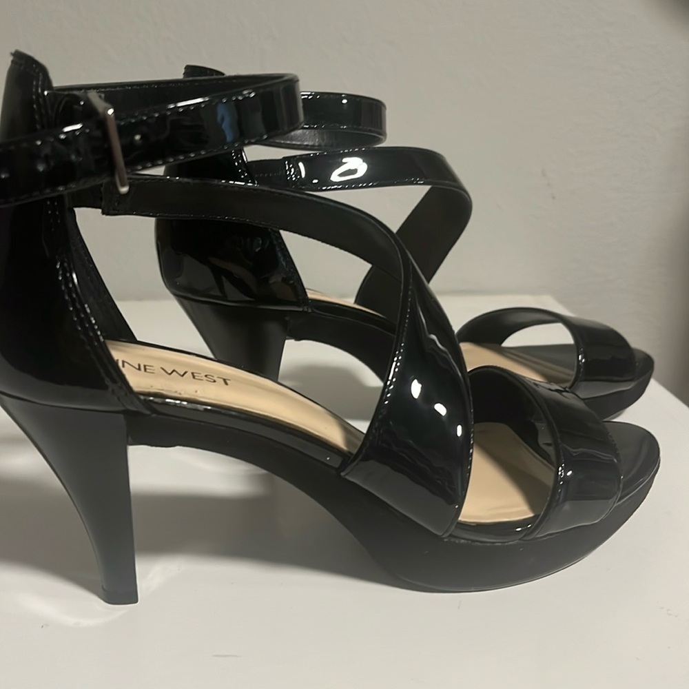 Nine West black patent heel with platform size 8.